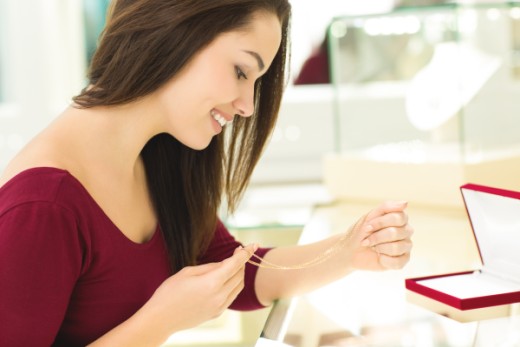 Mastercard woman buying jewelry credit Shutterstock 080722 520